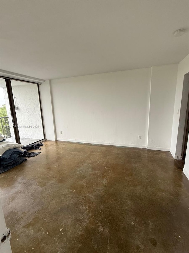 5701 Biscayne Blvd Unit 701, Miami, FL 33137 - unfurnished room featuring finished concrete floors and a smoke detector