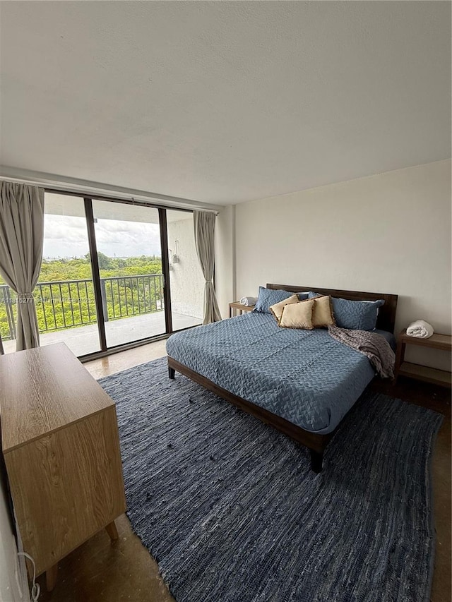 5701 Biscayne Blvd Unit 701, Miami, FL 33137 - bedroom featuring access to outside, multiple windows, and floor to ceiling windows