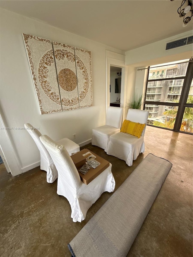 5701 Biscayne Blvd Unit 701, Miami, FL 33137 - living room featuring carpet flooring and baseboards