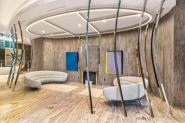 1000 Brickell Plz Unit 2705, Miami, FL 33131 - interior space featuring a freestanding tub, wood finished floors, a fireplace, and a shower with door