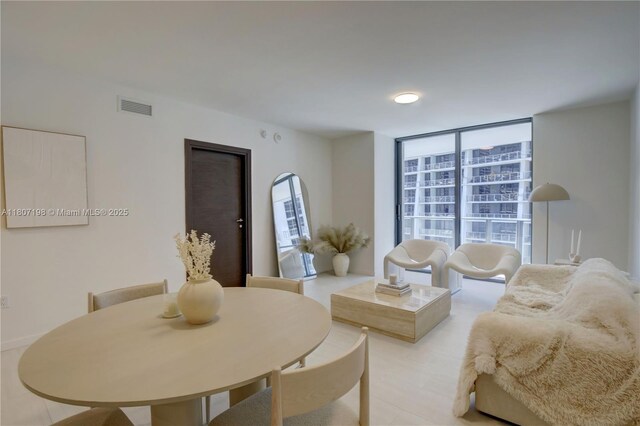 1000 Brickell Plz Unit 2705, Miami, FL 33131 - living area with a wall of windows
