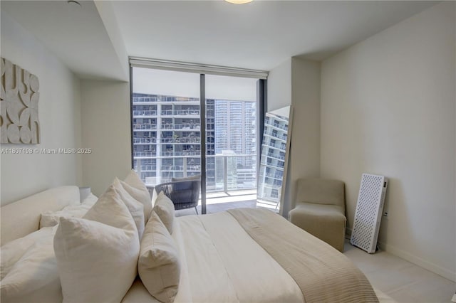 1000 Brickell Plz Unit 2705, Miami, FL 33131 - bedroom featuring a wall of windows