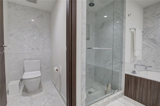 1000 Brickell Plz Unit 2705, Miami, FL 33131 - full bath with tile walls, a marble finish shower, marble finish flooring, and vanity