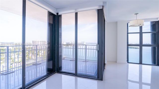 4000 Towerside Ter Unit 2201, Miami, FL 33138 - unfurnished room with floor to ceiling windows and tile patterned floors