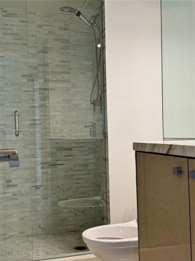 4000 Towerside Ter Unit 2201, Miami, FL 33138 - bathroom featuring a shower stall and toilet