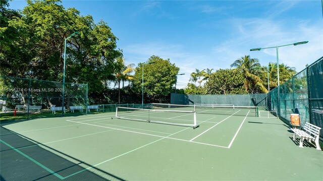 4000 Towerside Ter Unit 2201, Miami, FL 33138 - view of tennis court featuring community basketball court
