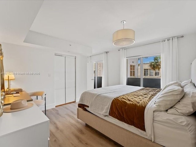 1532 Drexel Ave Unit 204, Miami Beach, FL 33139 - bedroom featuring light wood finished floors and baseboards