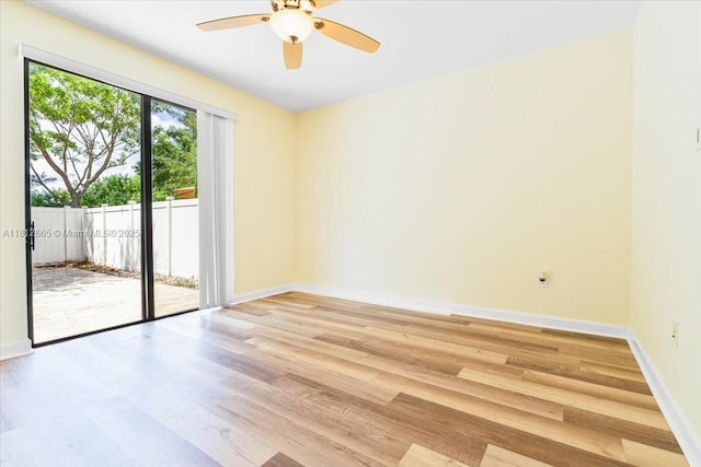 3420 W 92nd Pl, Hialeah, FL 33018 - empty room with light wood-style flooring, a ceiling fan, and baseboards