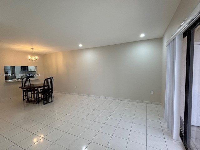 9230 NW 1st St Unit 206, Pembroke Pines, FL 33024 - dining room with a chandelier, recessed lighting, and light tile patterned flooring