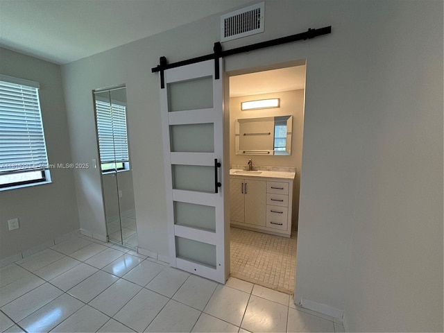 9230 NW 1st St Unit 206, Pembroke Pines, FL 33024 - bathroom featuring vanity, built in features, tile patterned flooring, and baseboards