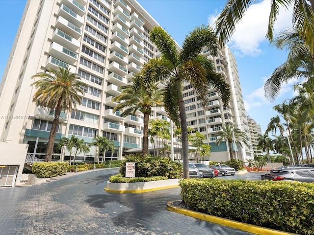 1200 W Ave Unit Ph24, Miami Beach, FL 33139 - view of apartment building / complex with uncovered parking