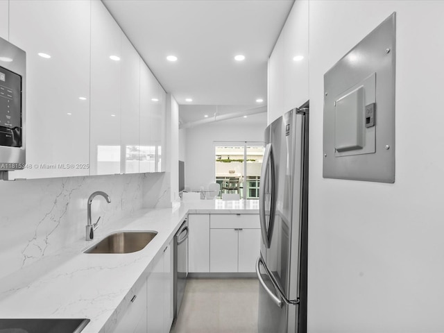 1200 W Ave Unit Ph24, Miami Beach, FL 33139 - kitchen featuring stainless steel appliances, modern cabinets, a sink, and recessed lighting