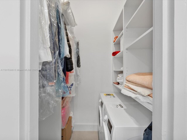 1200 W Ave Unit Ph24, Miami Beach, FL 33139 - spacious closet featuring washing machine and clothes dryer