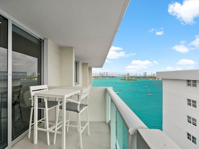 1200 W Ave Unit Ph24, Miami Beach, FL 33139 - balcony featuring a water view and a city view