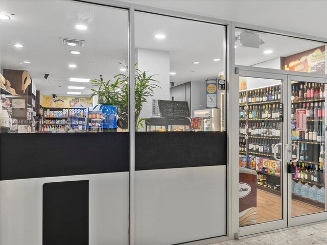 1200 W Ave Unit Ph24, Miami Beach, FL 33139 - welcome area featuring a bar and recessed lighting