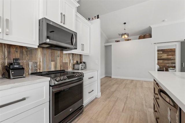 14420 NW 16th St, Pembroke Pines, FL 33028 - kitchen with appliances with stainless steel finishes, ornamental molding, white cabinetry, backsplash, and light wood-style flooring