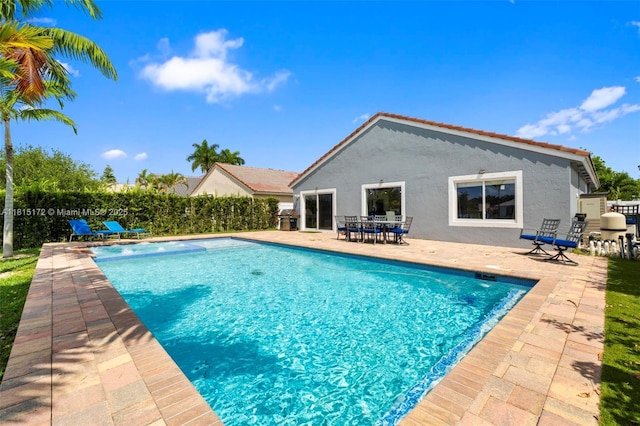 14420 NW 16th St, Pembroke Pines, FL 33028 - view of pool featuring a patio and outdoor dining space