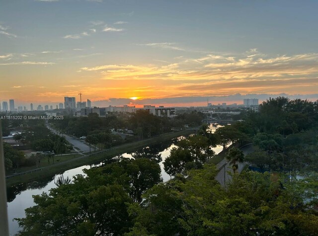 16850 S Glades Dr Unit 8G, North Miami Beach, FL 33162 - aerial view of property's location with skyline and a large body of water