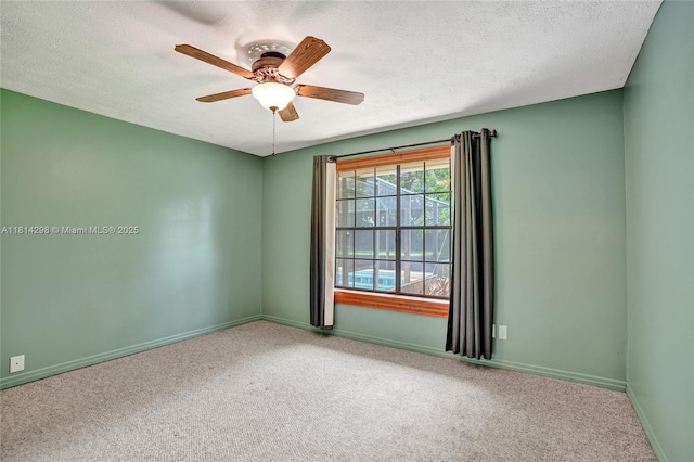 2398 SE Bordeaux Ct, Port St Lucie, FL 34952 - carpeted spare room with a textured ceiling, ceiling fan, and baseboards