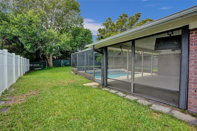 2398 SE Bordeaux Ct, Port St Lucie, FL 34952 - view of yard featuring glass enclosure