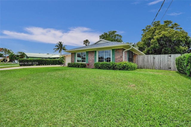 2398 SE Bordeaux Ct, Port St Lucie, FL 34952 - single story home featuring an attached garage, brick siding, and driveway