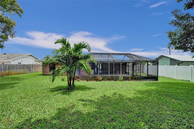 2398 SE Bordeaux Ct, Port St Lucie, FL 34952 - rear view of house featuring glass enclosure
