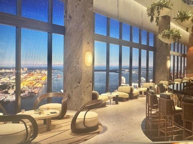 300 N Biscayne Blvd Unit 8502, Miami, FL 33132 - common area with a water view, a high ceiling, and floor to ceiling windows
