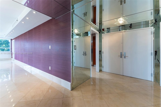 10205 Collins Ave Unit 401, Bal Harbour, FL 33154 - corridor featuring light tile patterned flooring and recessed lighting