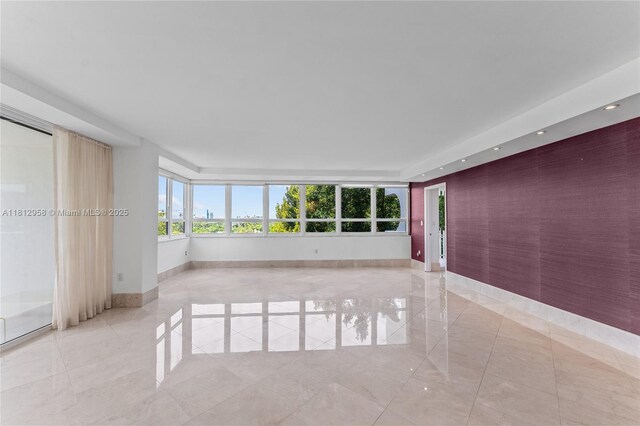 10205 Collins Ave Unit 401, Bal Harbour, FL 33154 - unfurnished room featuring light tile patterned floors and baseboards