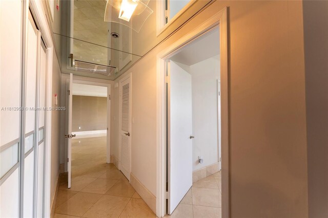 10205 Collins Ave Unit 401, Bal Harbour, FL 33154 - hall featuring light tile patterned floors