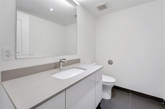 1600 NE 1st Ave Unit 1112, Miami, FL 33132 - bathroom featuring vanity, toilet, tile patterned floors, and baseboards