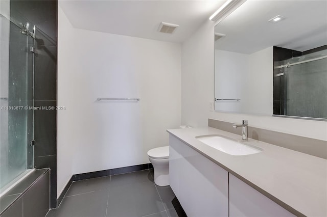 1600 NE 1st Ave Unit 1112, Miami, FL 33132 - bathroom with toilet, a shower with shower door, vanity, baseboards, and tile patterned flooring