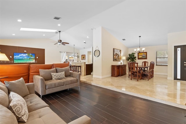 875 NW 108th Ln, Coral Springs, FL 33071 - living area featuring a chandelier, lofted ceiling, baseboards, a ceiling fan, and wood finished floors