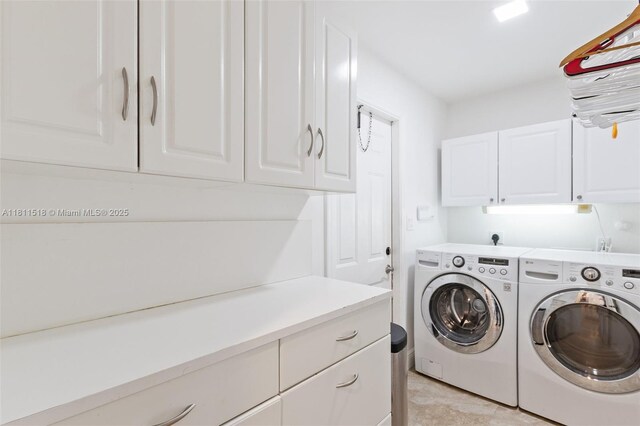 875 NW 108th Ln, Coral Springs, FL 33071 - laundry area featuring cabinet space and separate washer and dryer
