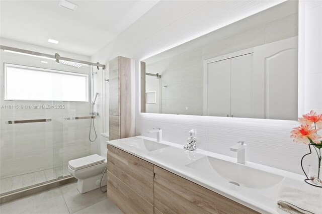 875 NW 108th Ln, Coral Springs, FL 33071 - full bath featuring a stall shower, double vanity, toilet, and tile patterned flooring