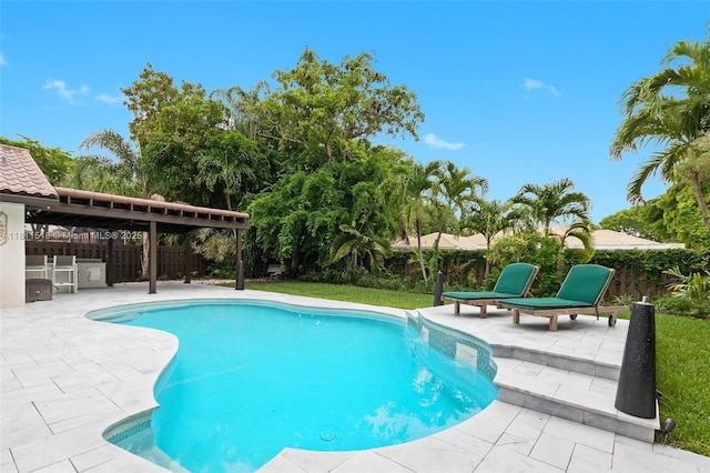 875 NW 108th Ln, Coral Springs, FL 33071 - swimming pool featuring a fenced backyard and a patio