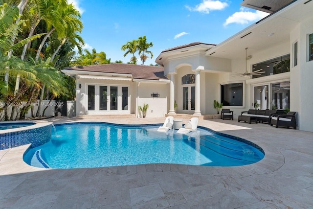127 Swan Ave, Plantation, FL 33324 - view of pool with french doors, a patio area, a pool with connected hot tub, an outdoor hangout area, and ceiling fan