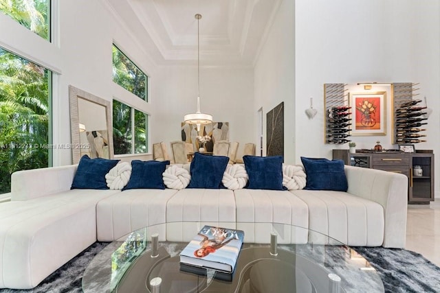 127 Swan Ave, Plantation, FL 33324 - living area with a high ceiling and ornamental molding
