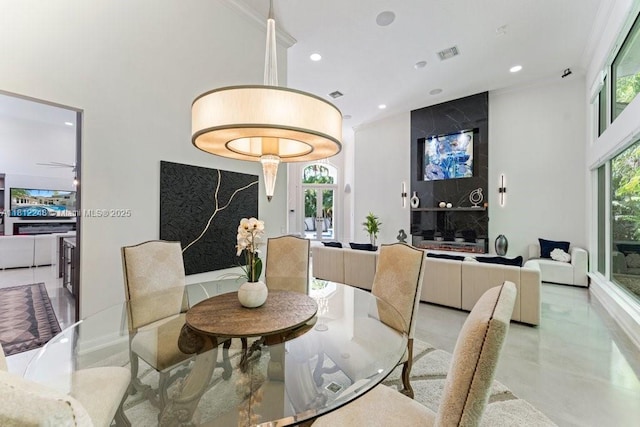 127 Swan Ave, Plantation, FL 33324 - dining area featuring recessed lighting, concrete flooring, and a high ceiling