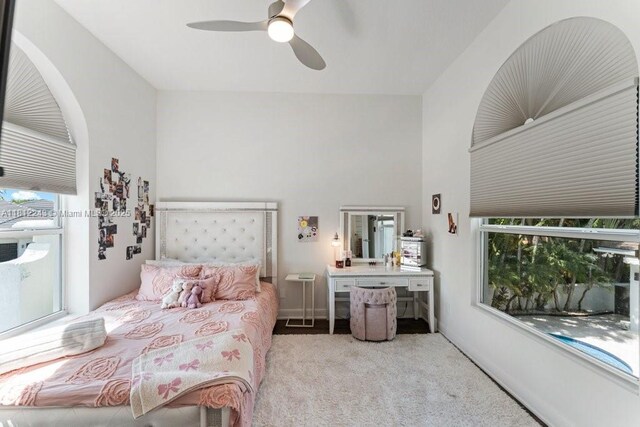 127 Swan Ave, Plantation, FL 33324 - bedroom featuring multiple windows, carpet flooring, a ceiling fan, and baseboards