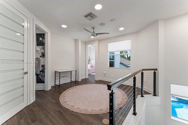 127 Swan Ave, Plantation, FL 33324 - hall featuring an upstairs landing, dark wood finished floors, recessed lighting, and baseboards