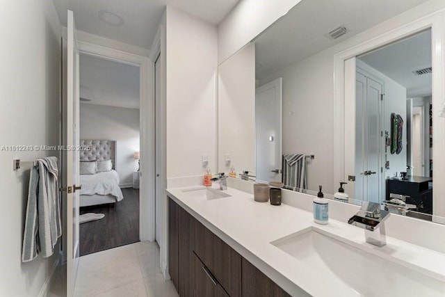 127 Swan Ave, Plantation, FL 33324 - bathroom with ensuite bathroom, double vanity, and tile patterned flooring