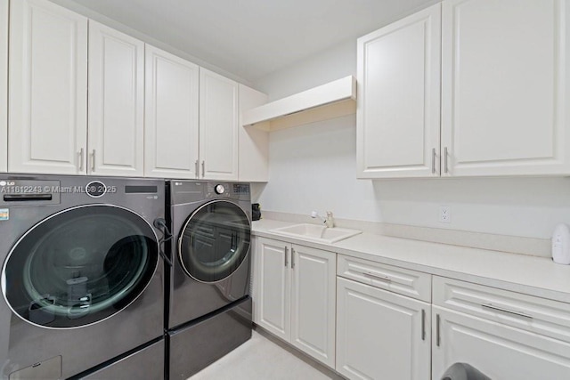 127 Swan Ave, Plantation, FL 33324 - laundry room featuring separate washer and dryer and cabinet space