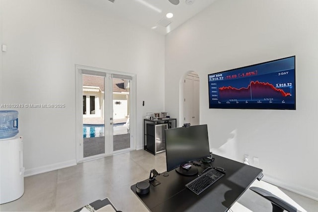 127 Swan Ave, Plantation, FL 33324 - office with arched walkways, a towering ceiling, baseboards, and french doors