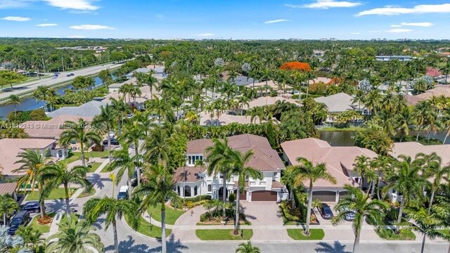127 Swan Ave, Plantation, FL 33324 - aerial overview of property's location with nearby suburban area and a nearby body of water
