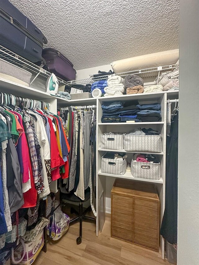 7850 W Mcnab Rd Unit 212, Tamarac, FL 33321 - walk in closet with wood finished floors