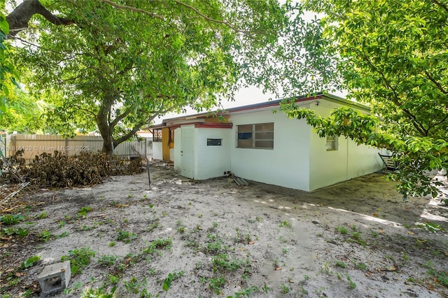 2210 NW 154th St, Miami Gardens, FL 33054 - rear view of house featuring stucco siding