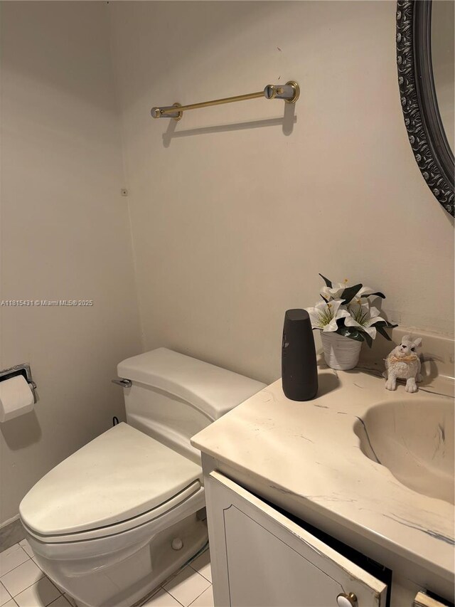 1865 S Ocean Dr Unit 11I, Hallandale Beach, FL 33009 - bathroom featuring vanity, toilet, and tile patterned floors