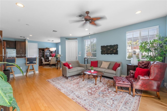 7702 Paddock Pl, Davie, FL 33328 - living area with ceiling fan, light wood finished floors, and recessed lighting