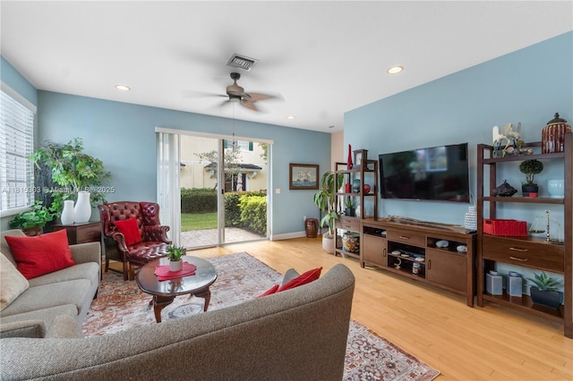 7702 Paddock Pl, Davie, FL 33328 - living area with a ceiling fan, wood finished floors, and recessed lighting